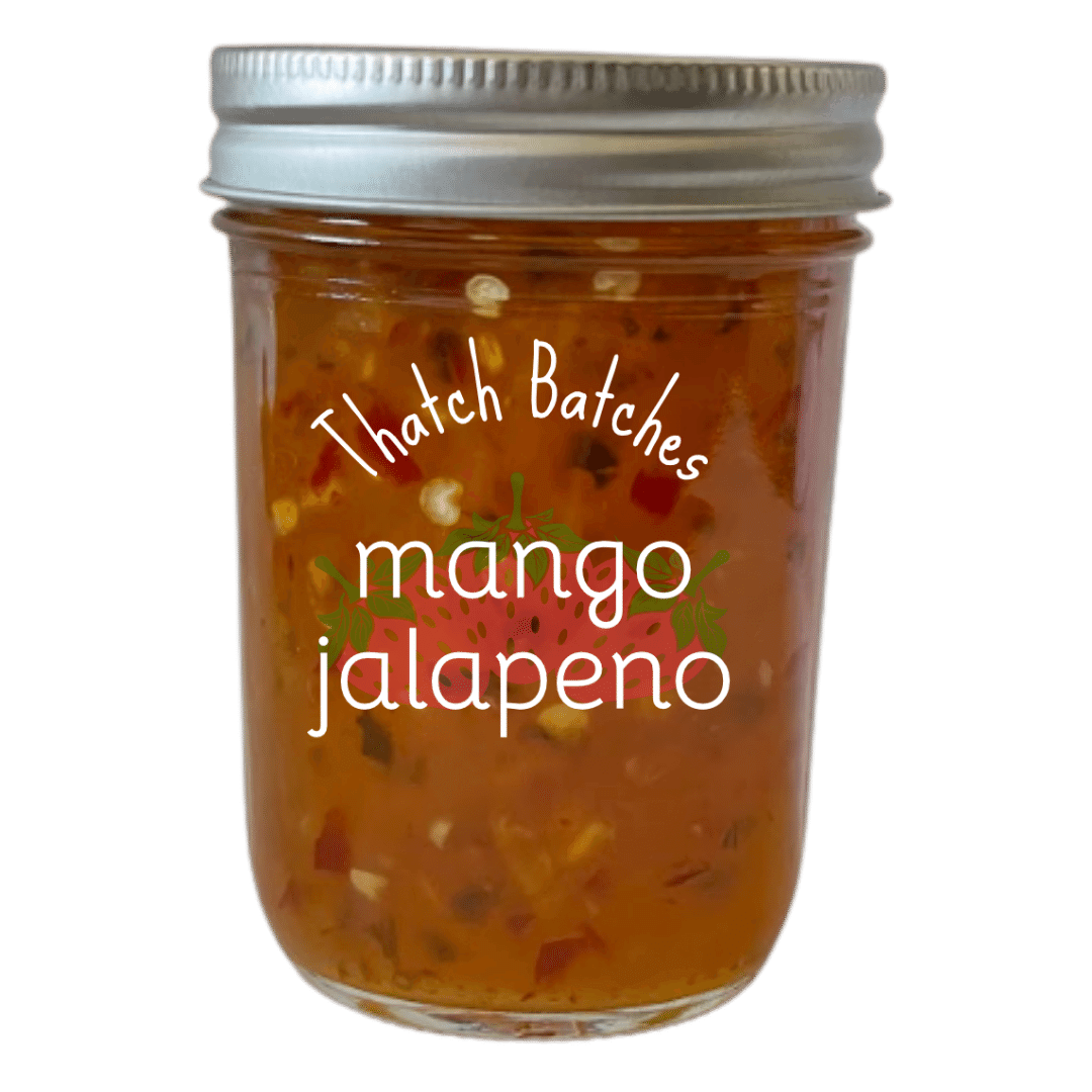 A jar of mango jalapeño jam is a great tasting snack with some crackers and cream cheese!