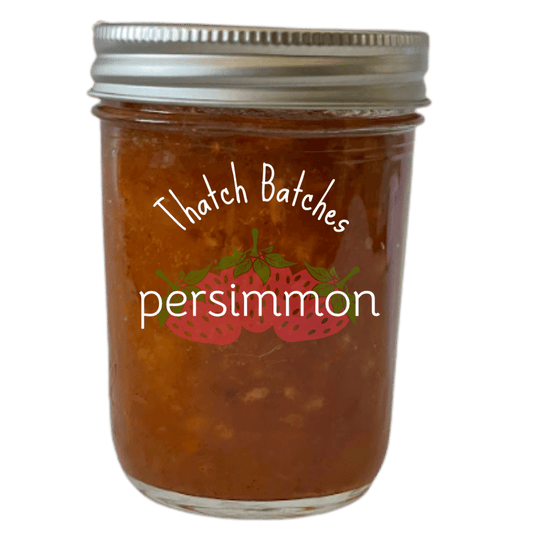 A jar of persimmon jam is a great sweet jam with a touch of cinnamon.