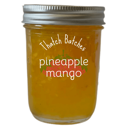 A jar of pineapple mango jam is a tropical fusion flavor of two hemispheres!