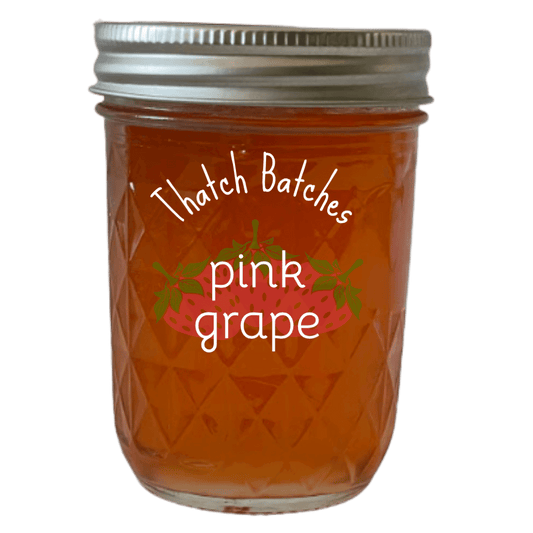 A jar of pink grape jelly is like regular grape jelly, except it's better because it's pink!