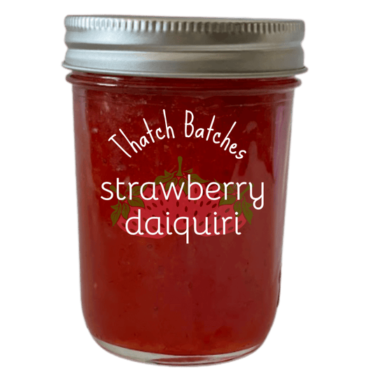 A jar of strawberry daiquiri jam has all the delicious flavors of a strawberry daiquiri, but none of the bad aftereffects of a strawberry daiquiri!