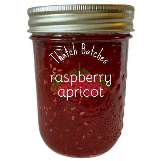 A jar of raspberry apricot jam is an unexpectedly delightful jam!