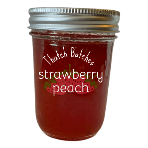 A jar of strawberry peach jam is the most summertime of days gone by flavor.